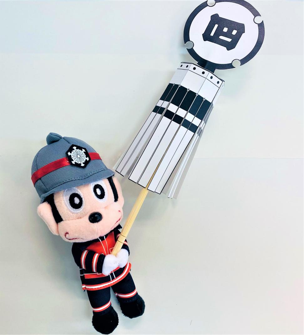 まといを持つケシもん